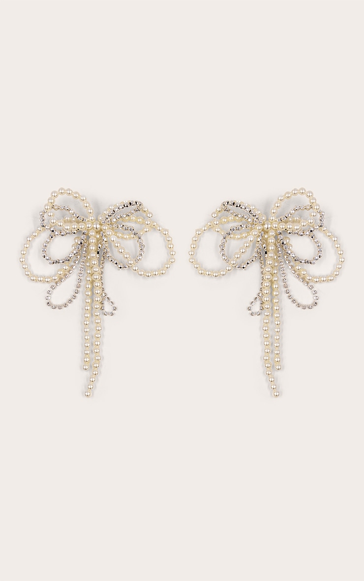 Boucles d'oreilles imposantes argentées en noeud à perles et strass image 2