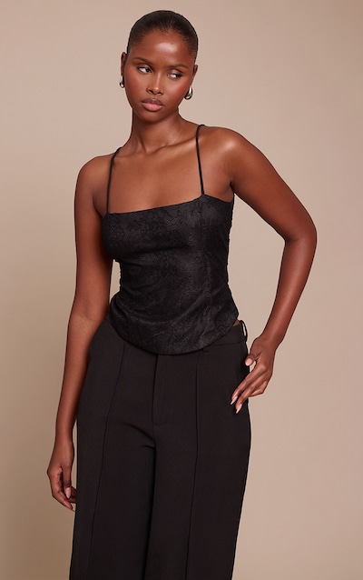 Corset en dentelle noire à bretelles fines