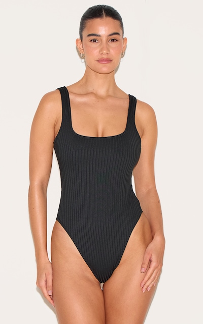 Maillot de bain texturé noir à rayures et col rond