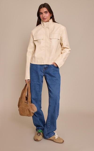 Jean boyfriend bleu moyen délavé échancré dans le dos