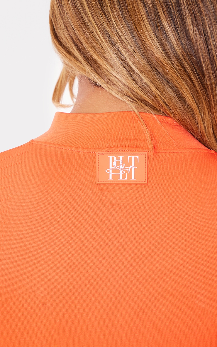 PRETTYLITTLETHING Shape Top de sport rouge à zip doublé et logo image 4