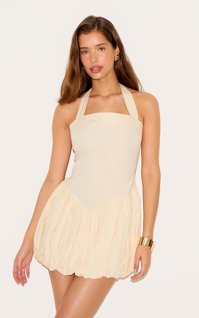 Robe bouffante crème au beurre à dos nu