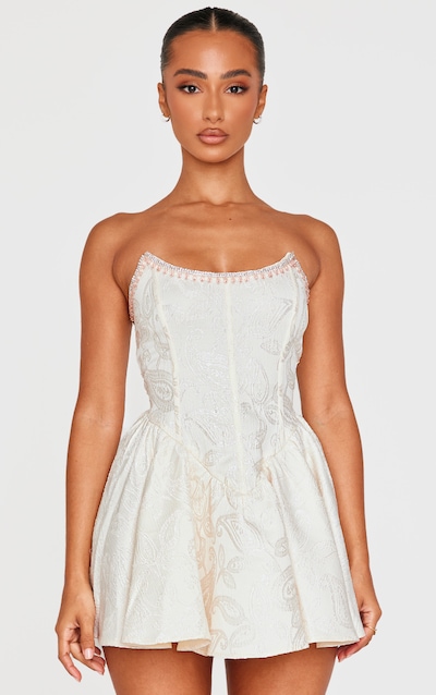 Petite Micro robe style bustier crème à ornements