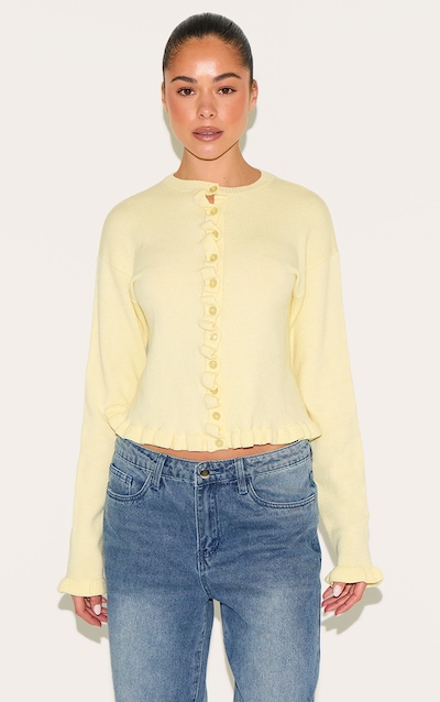 Cardigan en maille tricot crème au beurre à volants