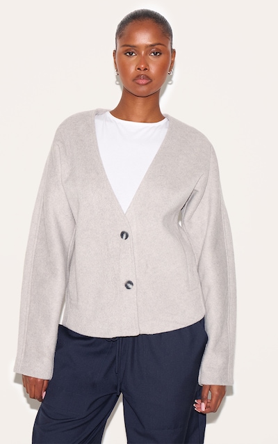 Veste en effet laine gris à col en V et boutons