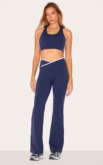 Pantalon de yoga en Sculpt bleu marine à taille croisée et lisérés contrastants