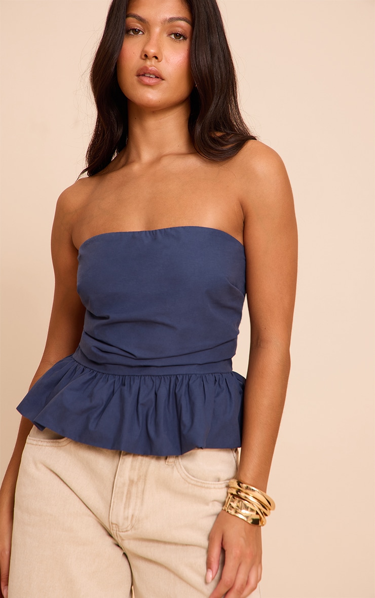 Top bustier péplum en coton bleu marine à volants image 1