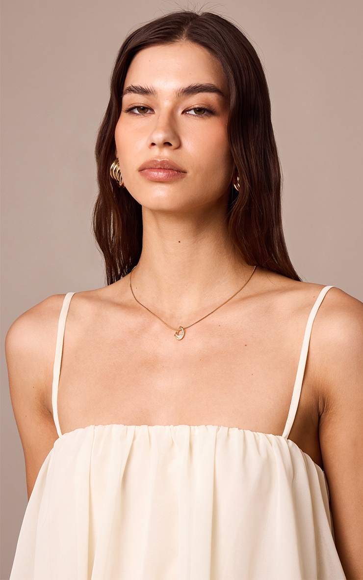 Gold Twist Cut Out Pendant Necklace image 1