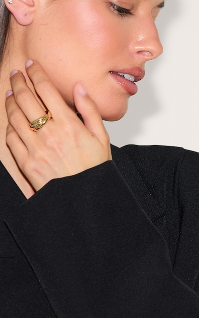 Bague torsadée nouée dorée