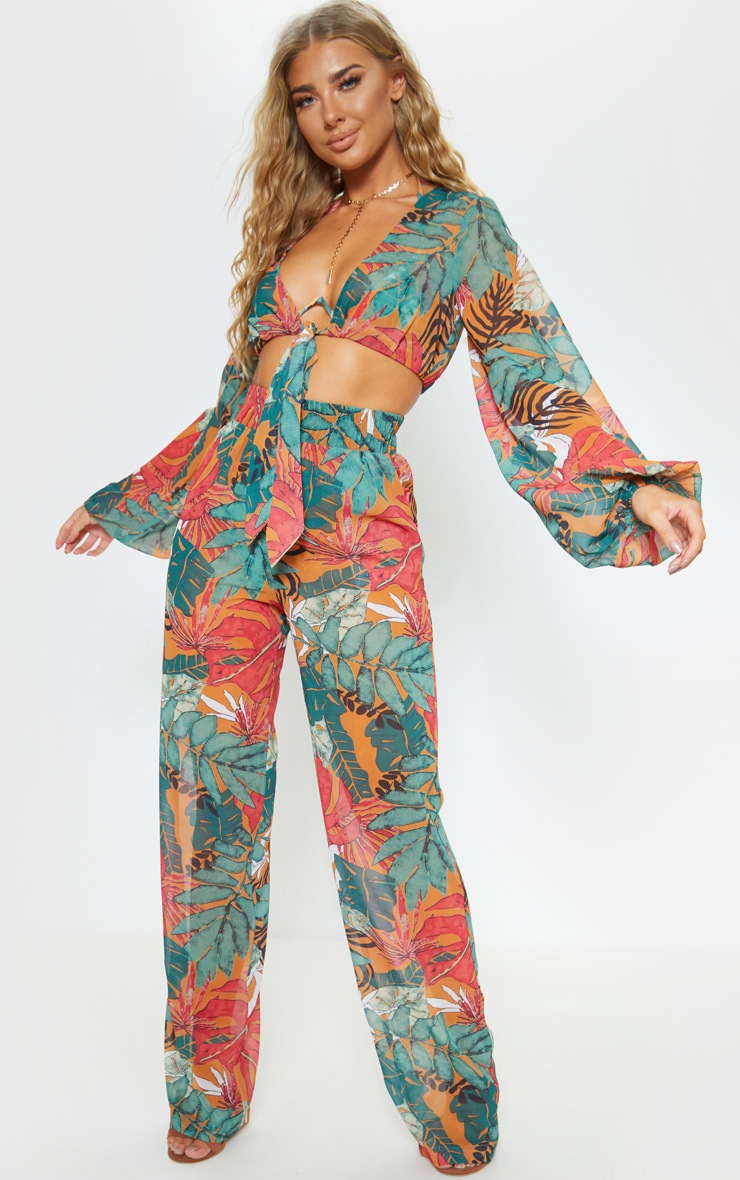Pantalon de plage à jambes évasées orange imprimé feuilles