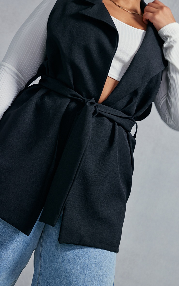 sleeveless tie waist blazer