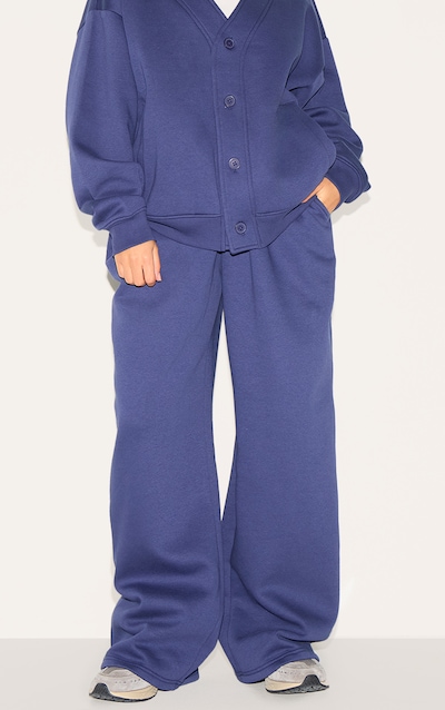 Petite Jogging large bleu marine à taille élastique et cordons ajustables
