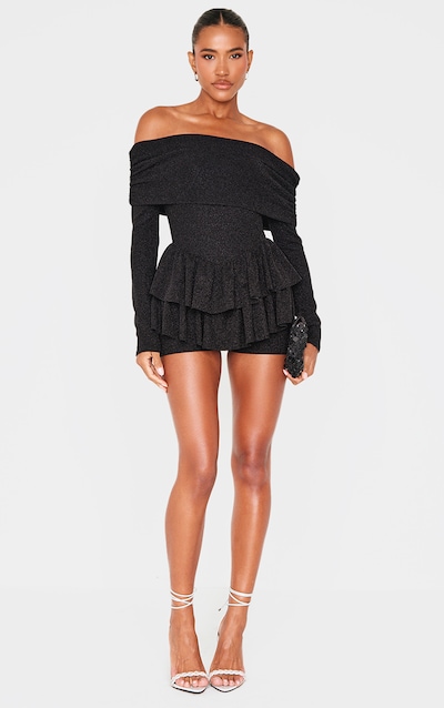 Combishort style tutu noir pailleté à manches longues et col bardot