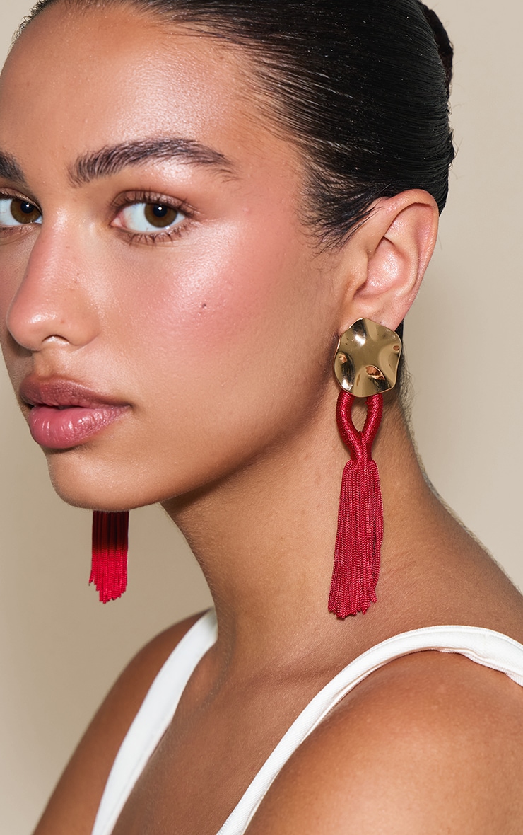 Gold Hammered Circular Earrings with Red Tassel Detail image 1