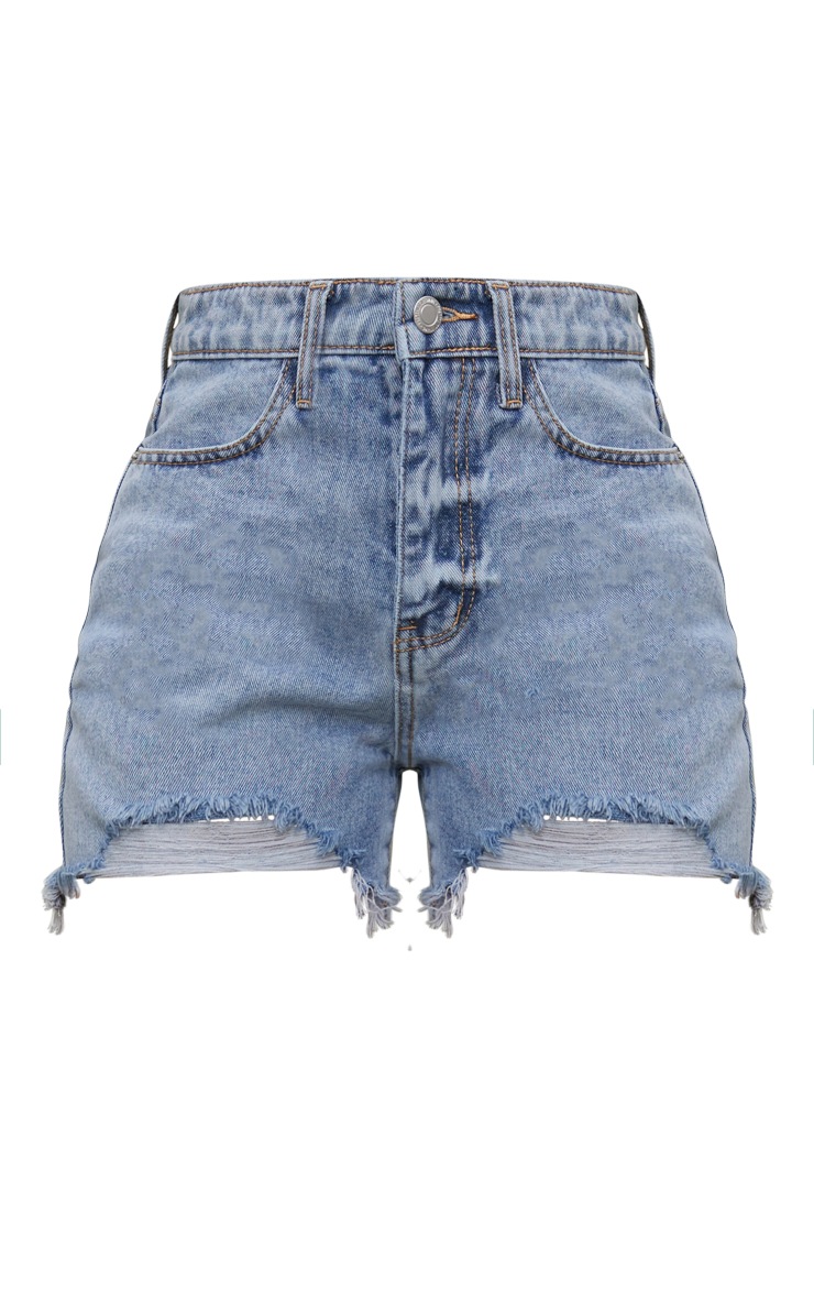 Pair Of Light Wash Ripped Denim Shorts With A Raw Hem
