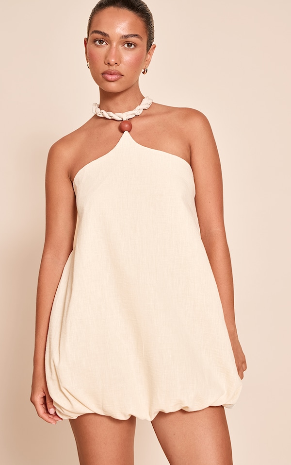Mini robe bouffante en mousseline de soie crème à dos nu