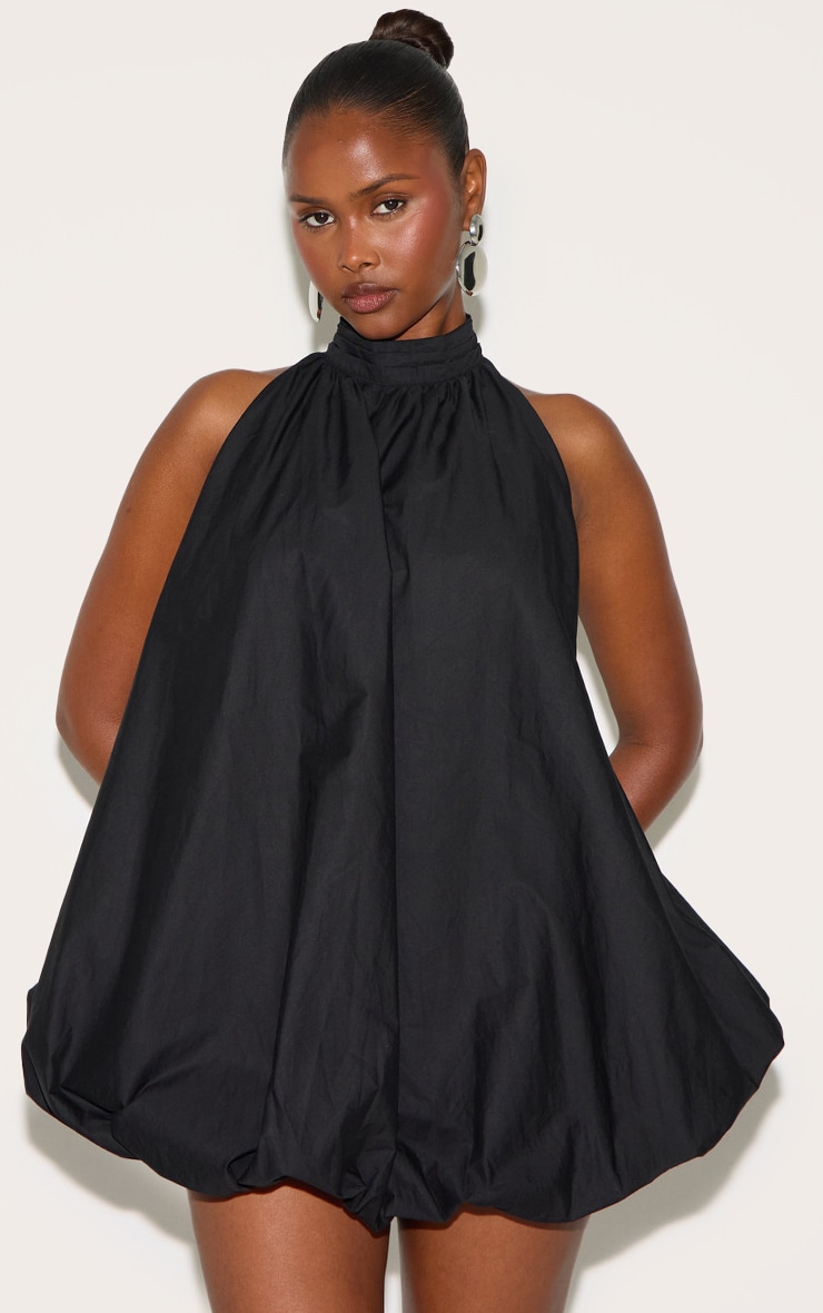 Mini robe noire à dos nu et ourlet bouffant image 1