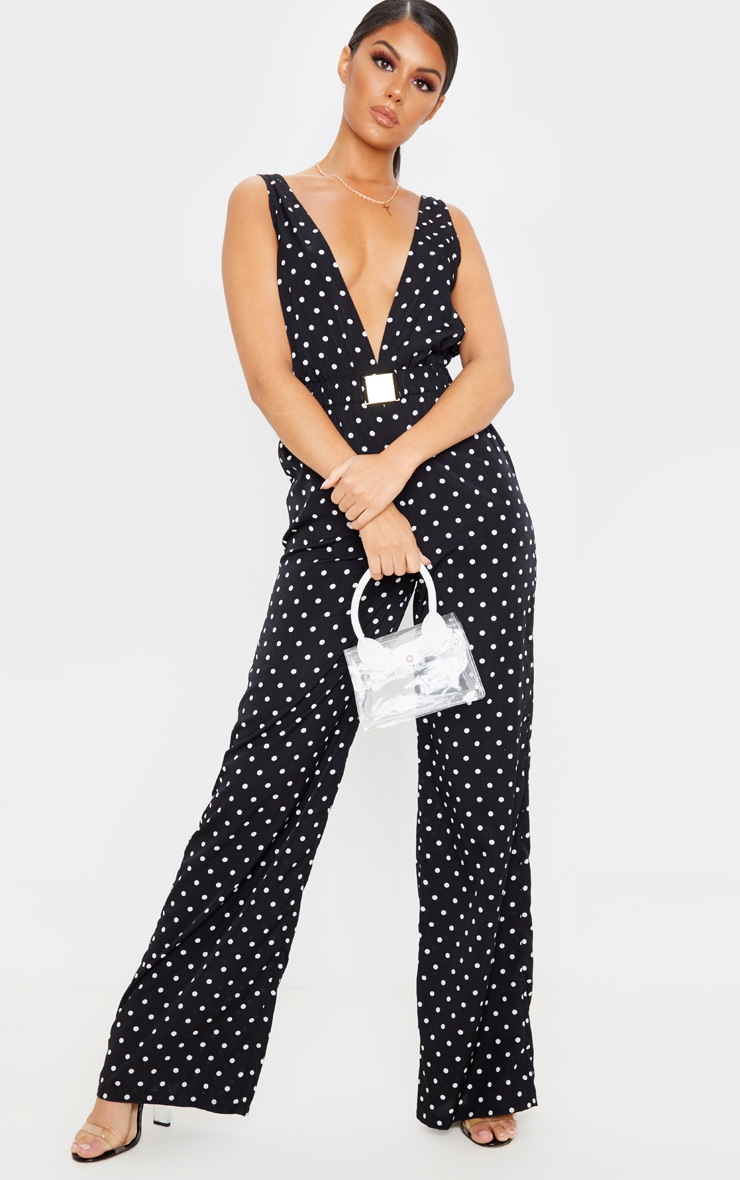 Combinaison à pois noire et blanche avec ceinture
