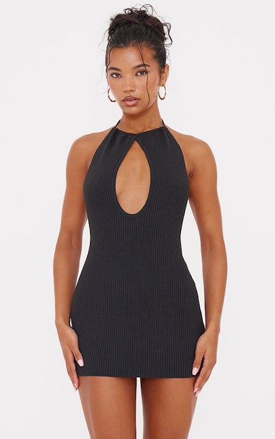 Mini robe en maille fine noire à dos nu