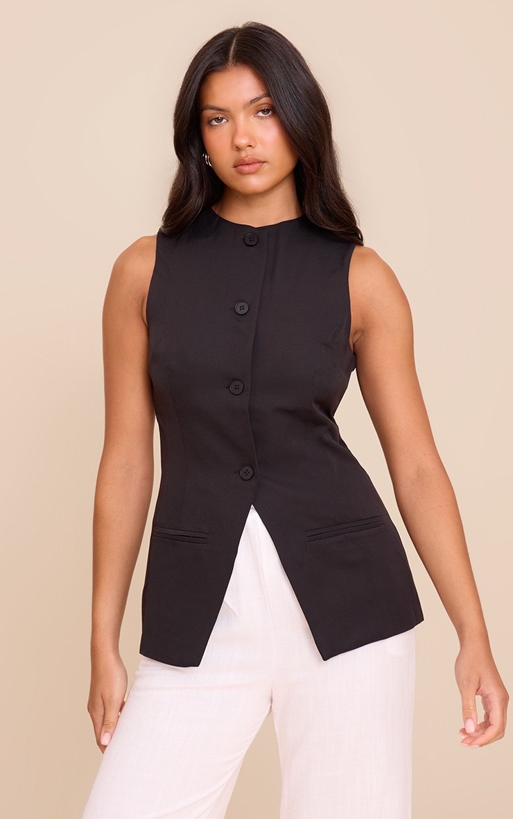 Gilet noir sans manches à boutons image 1