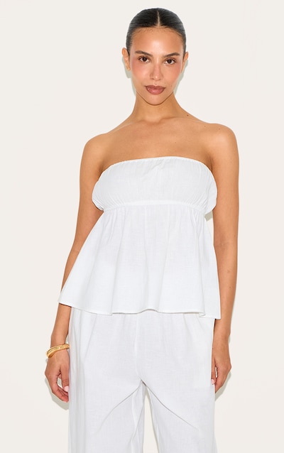 Petite Top bustier péplum en effet lin blanc