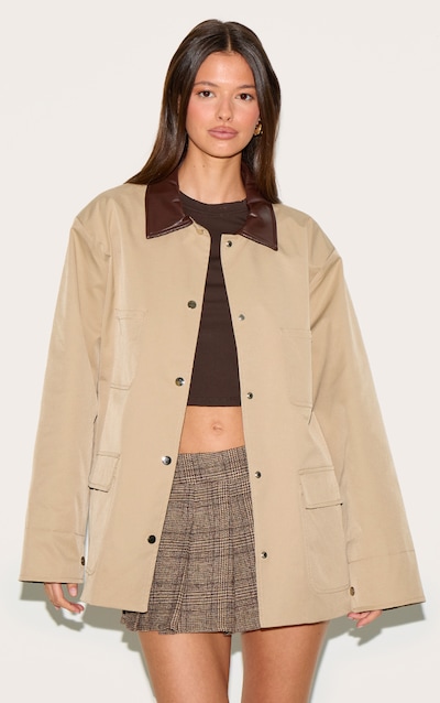 Veste enduite caoutchoutée beige à col contrastant