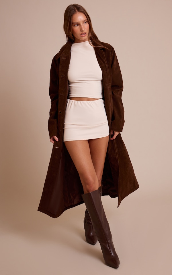 Mini-jupe côtelée brossée crème à taille élastique