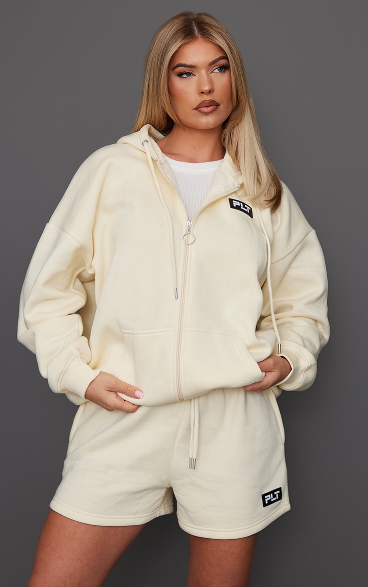 PRETTYLITTLETHING Cream Badge Oversized Runner Shorts ...