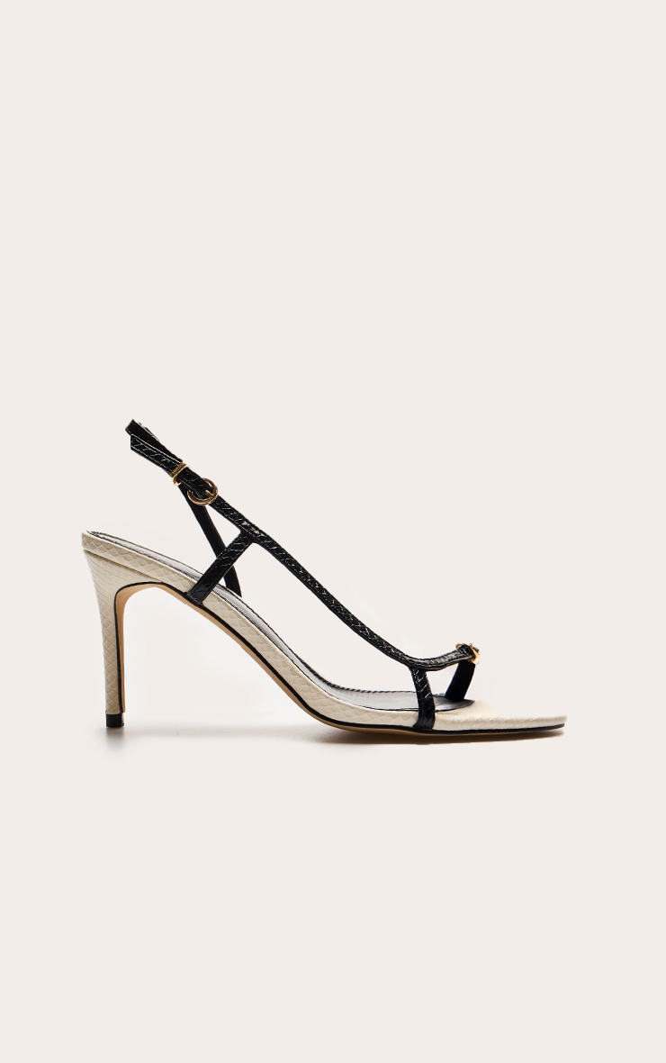 Sandales rondes en PU noir et blanc à talon moyen et brides asymétriques bouclées image 2