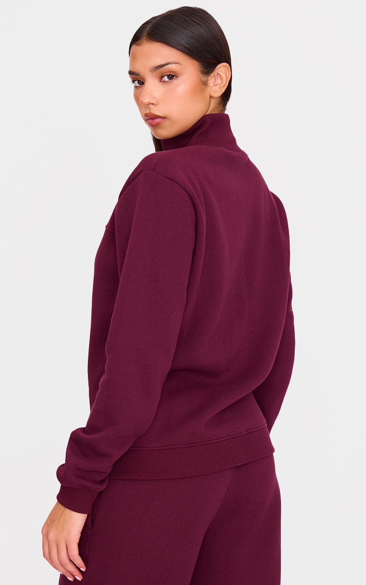 Burgundy Seam Zip Through High Neck Sweatshirt PrettyLittleThing CA