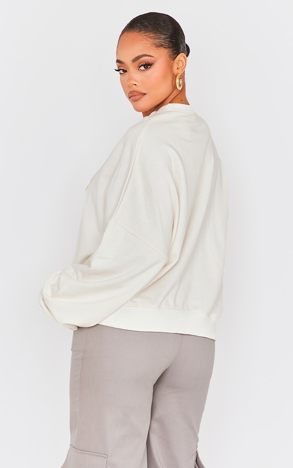 Cream Washed Cross Raw Edge Sweatshirt Tops PrettyLittleThing