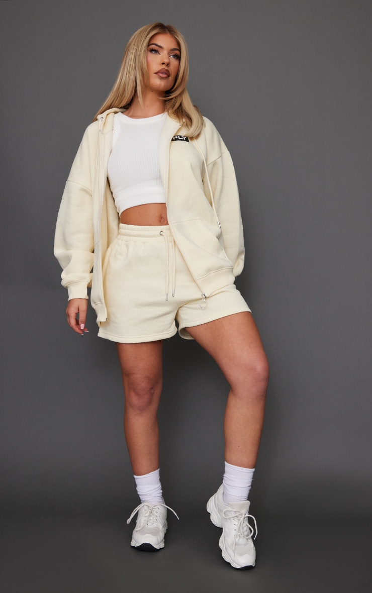 PRETTYLITTLETHING Cream Badge Oversized Runner Shorts