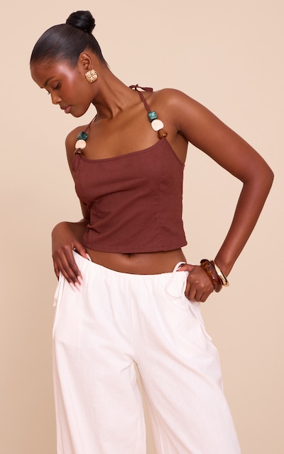 Top léger tissé chocolat à dos nu et empiècements