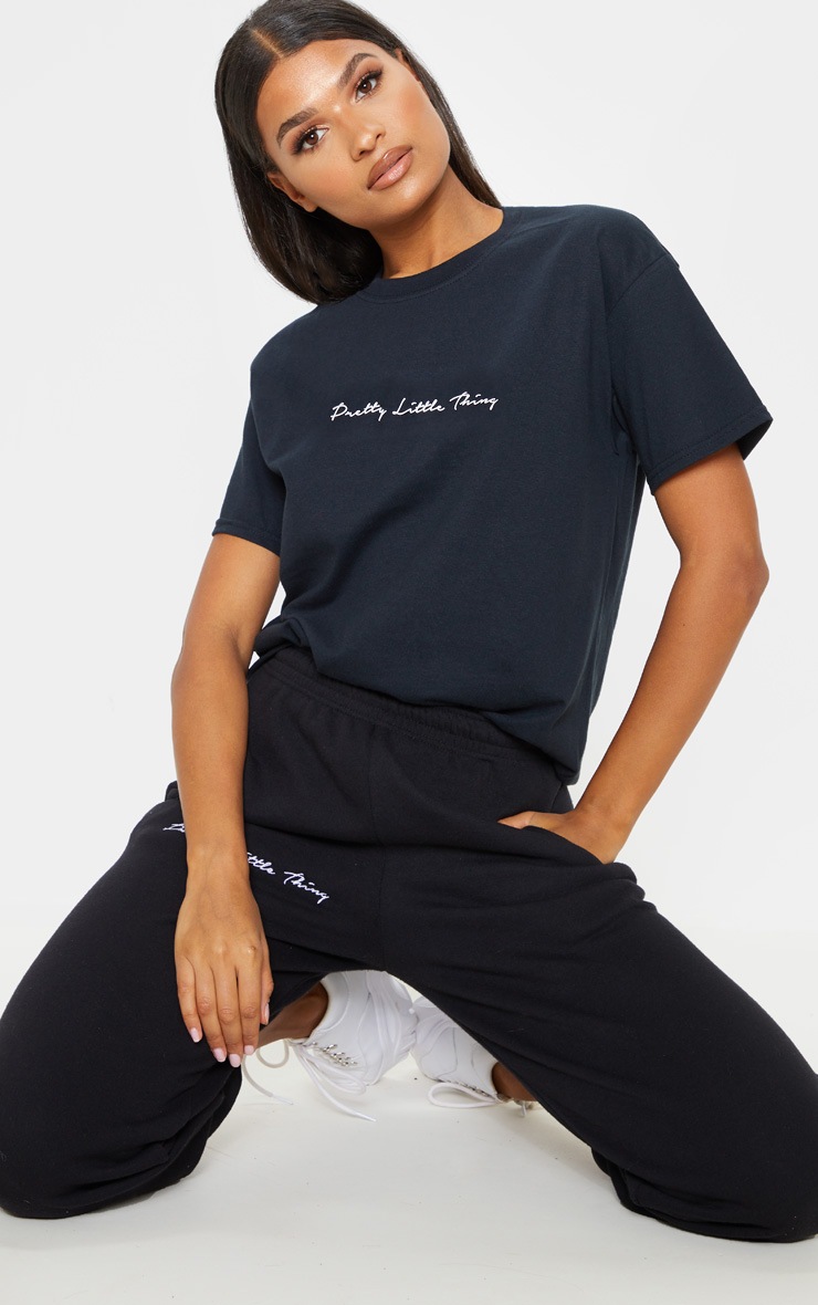 PRETTYLITTLETHING - T-shirt oversize noir à slogan