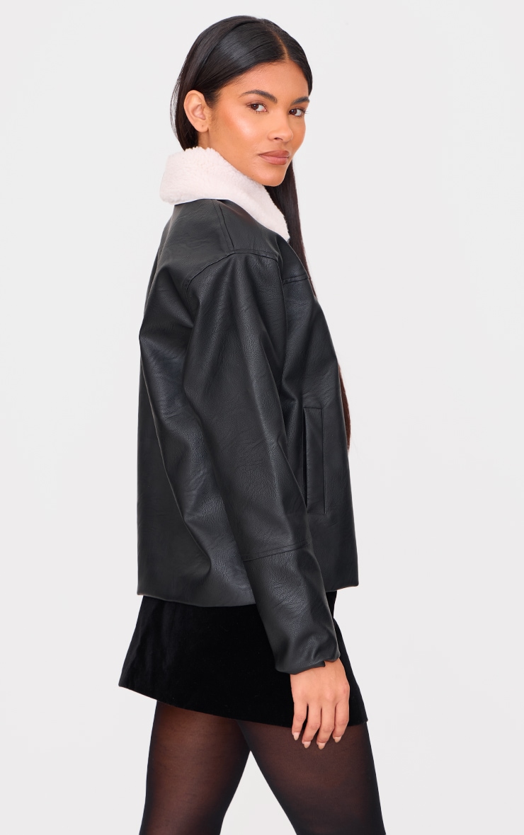 Veste en PU noir à col détachable en fausse fourrure image 2
