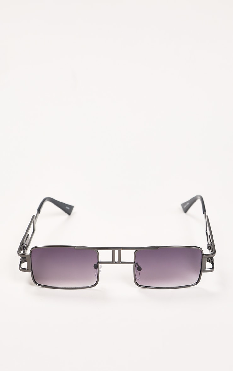 Lunettes de soleil verres teintés à monture noire et double barre