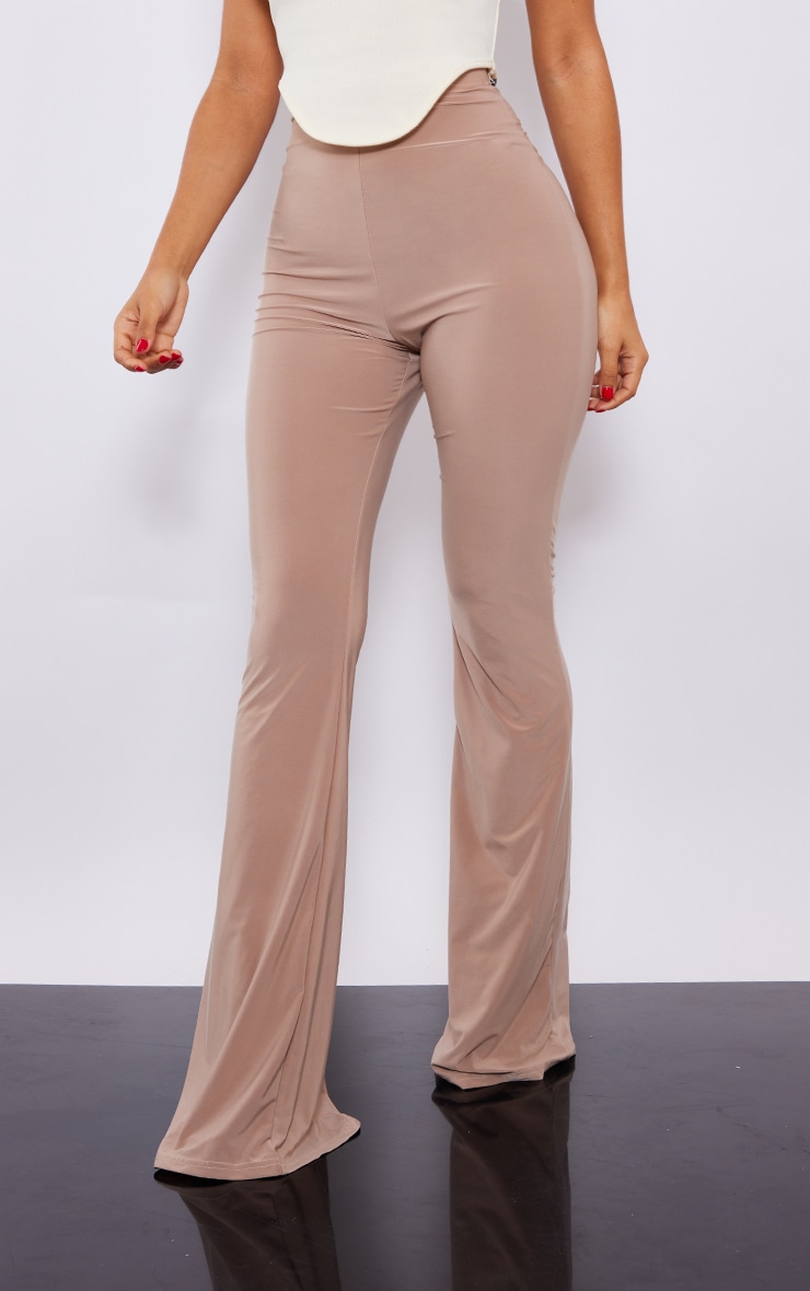 Petite Stone Slinky Ruched Bum Flare Trousers | Petite | PrettyLittleThing