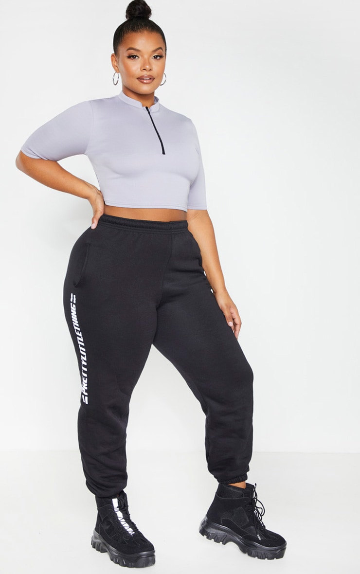 PLT Plus - Crop top en néoprène gris à zip frontal