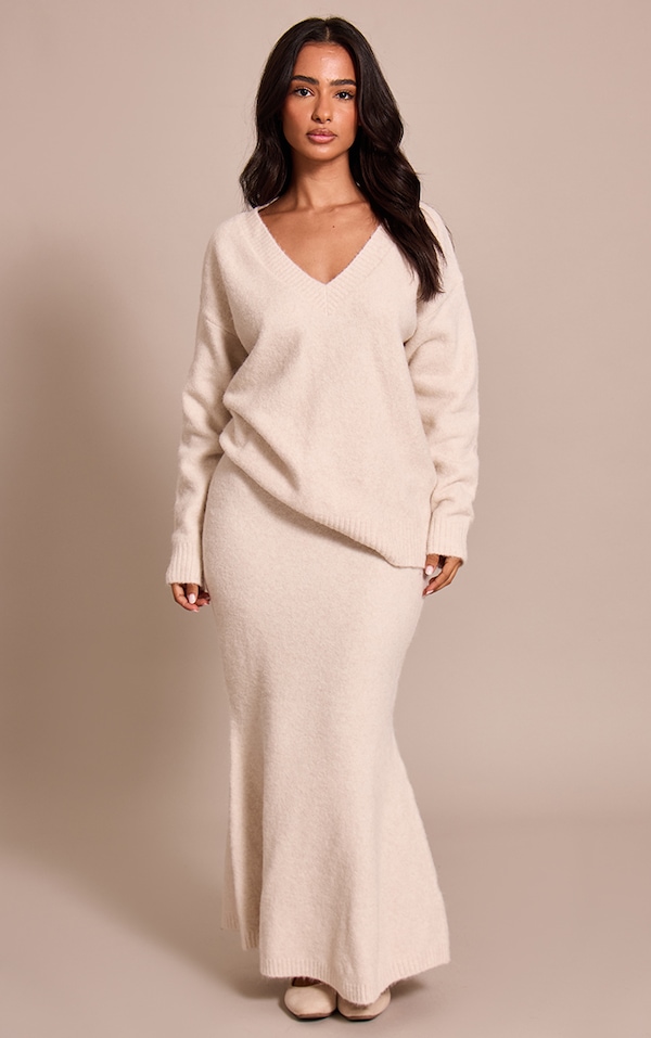 Petite jupe colonne mi-longue en maille tricot crème