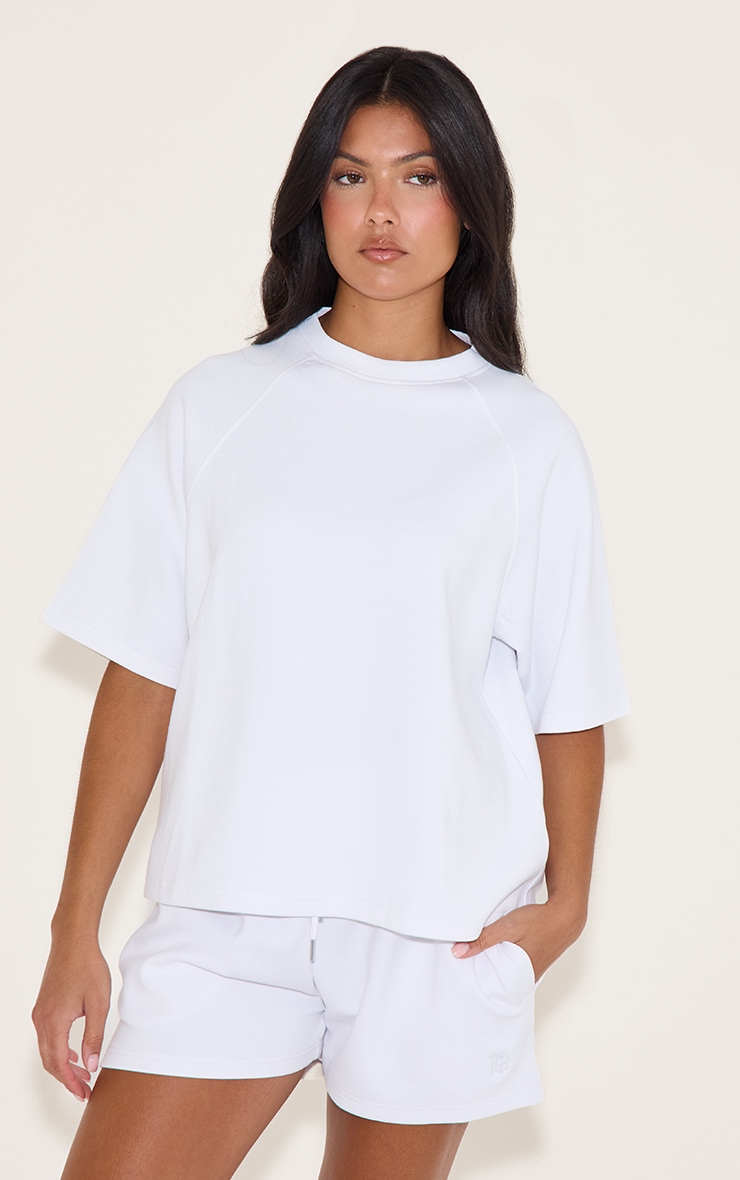T-shirt tissé blanc à épaules carrées et logo brodé image 1