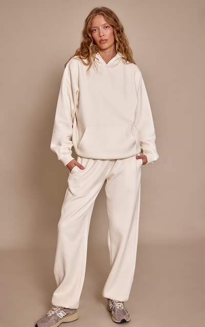 Jogging en coton polaire crème à ourlets resserrés