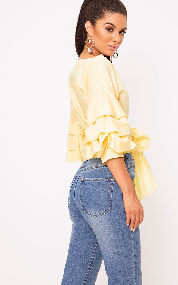 ruffle shoulder shirt