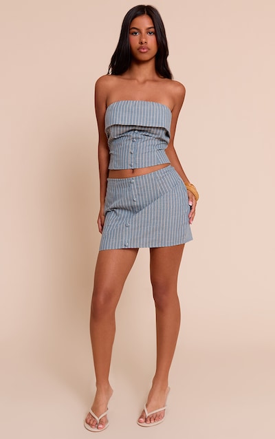 Petite Mini-jupe bleue à fines rayures et boutons