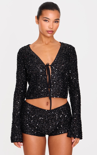 Top texturé noir noué à sequins