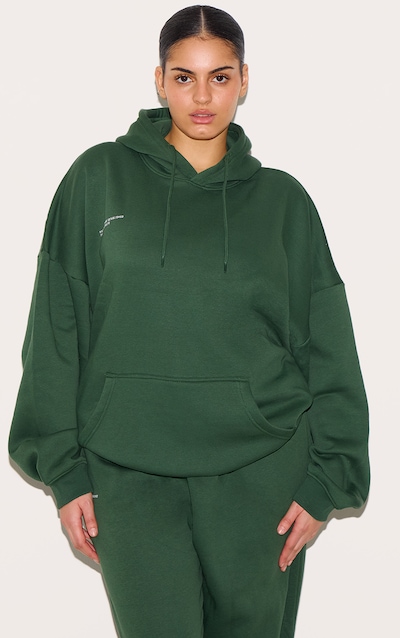 PRETTYLITTLETHING Plus Hoodie oversize vert forêt imprimé Established 2012