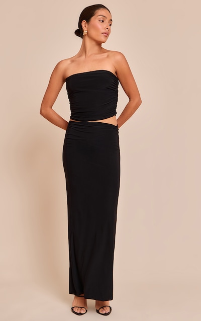 Petite Jupe longue noire à détail torsadé