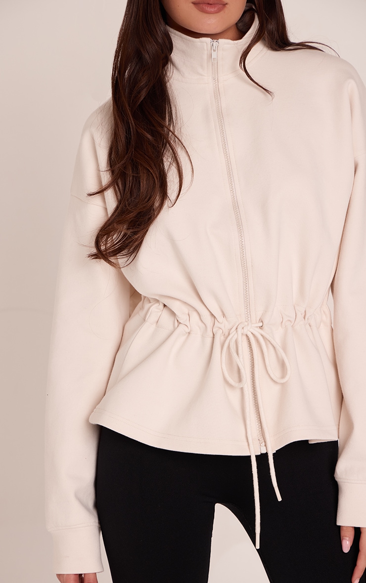 Cream Interlock Peplum Funnel Neck Zip Up Jacket image 4