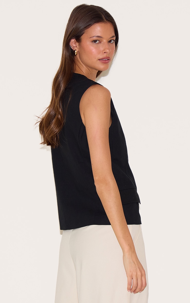 Black Boxy Asymmetric Waistcoat | Tops | PrettyLittleThing KSA