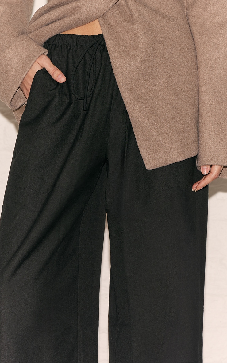 Pantalon décontracté tissé noir à cordons ajustables et taille basse image 4