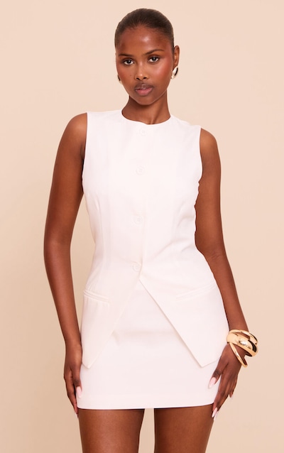 Gilet crème sans manches à boutons